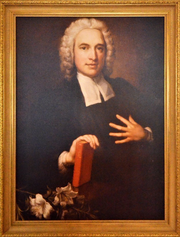 portrait of Charles Wesley with bible and frock.