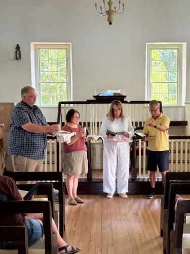 Pastors sharing communion