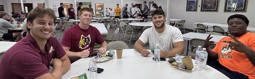 football players at table
